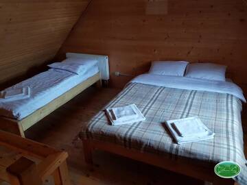 Фото номера Семейный номер с видом на горы Лоджи Dream Forest г. Tukholʼka 7